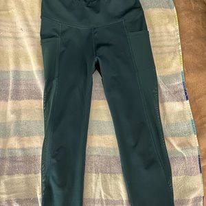 Women’s Embrace Your Love teal leggings with mesh on legs size M